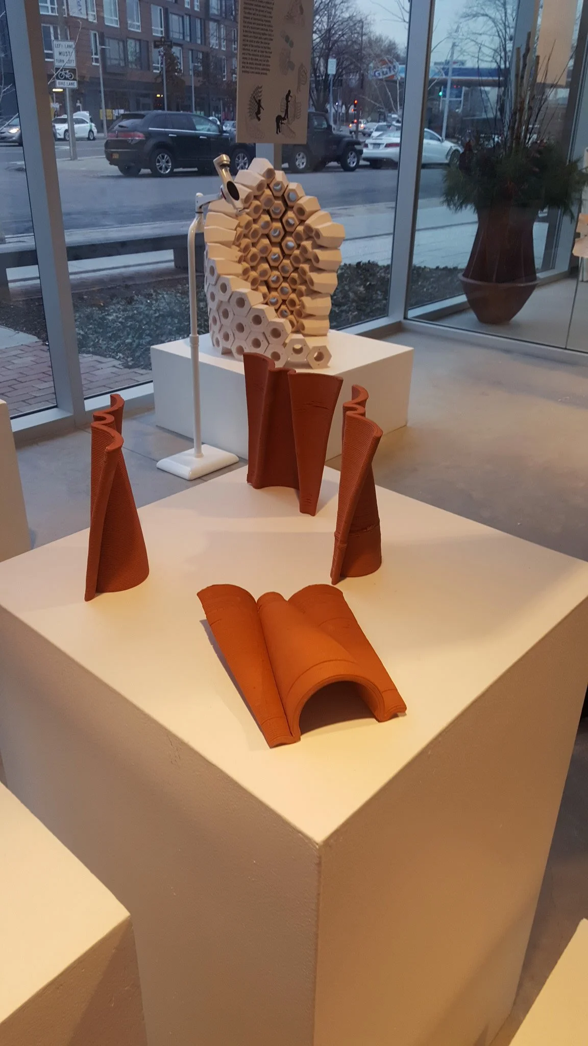 Exhibition install, group of prints on plinths